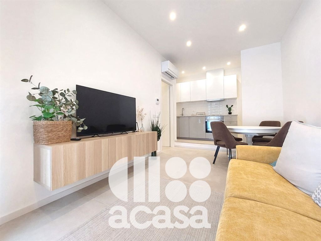 APPARTAMENTO NUOVO CON GIARDINO E GARAGE